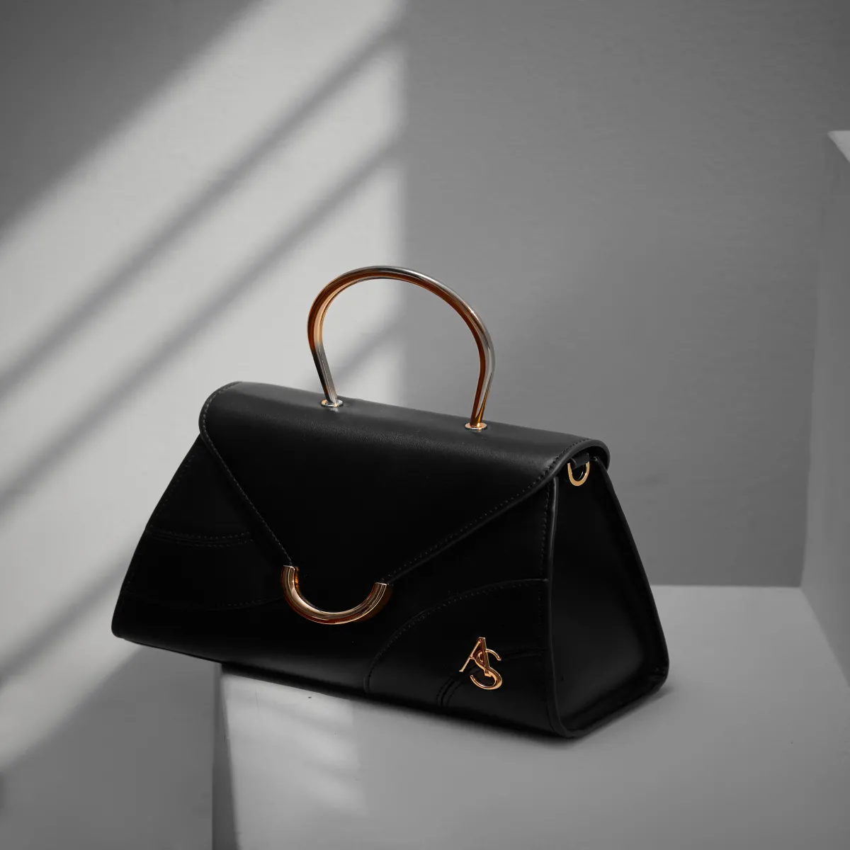 Tangola noir lisse